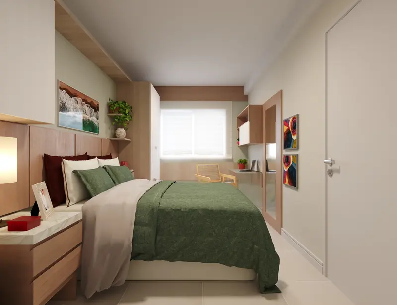 Suíte do apartamento Tipo A com cama de casal e home office